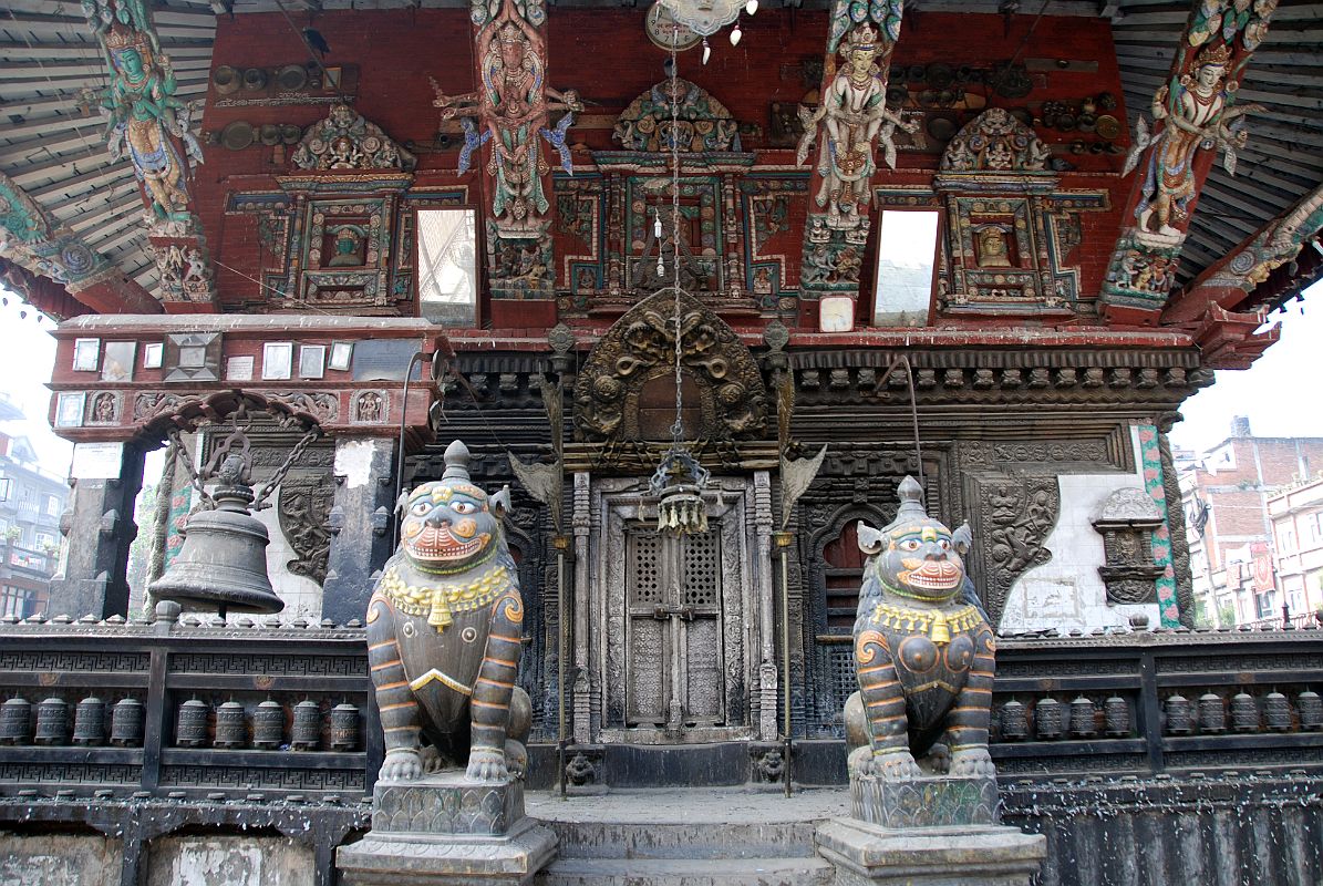 Kathmandu Patan 02-4 Rato Red Machhendranath Temple North Doorway Guarded By Two Snow Lions 